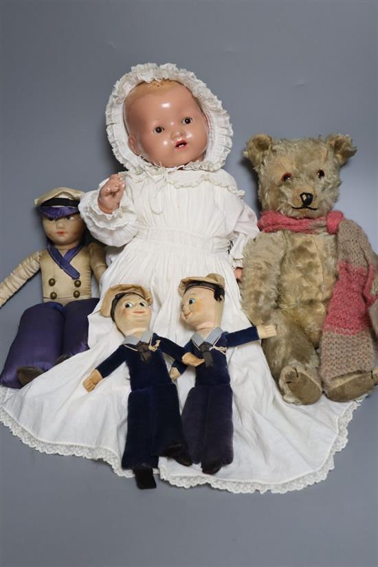 Three Nora Welling Sailor Boy dolls, a plush Teddy bear and an open mouthed doll